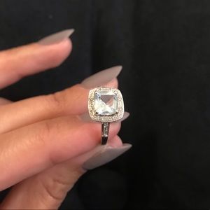 Aquamarine & Diamond Halo Ring in White Gold.